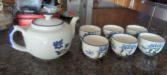 Ceramic Teapot and Cup Set with Floral Design