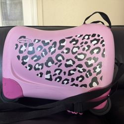 Samsonite Pink Kid Ride On luggage