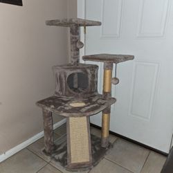 Cat tower with scratching ladder and posts three tiered