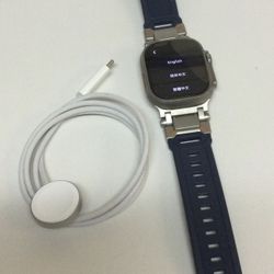 Apple Ultra Watch 3 Featuring A Blue Silicone Watch Strap W/ Integrated Titanium Colored Connectors Includes Charger