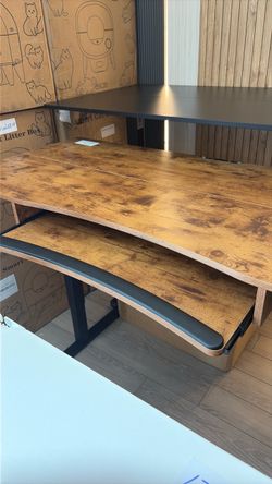 55 inches brown standing desk with keyboard support
