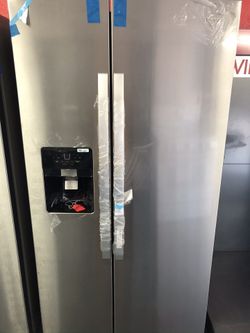 New scratch and dent whirlpool 25 cu ft stainless steel side by side fridge. 1 year warranty