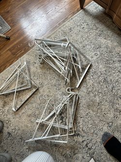 Heavy-duty slatwall shelf brackets in great condition.