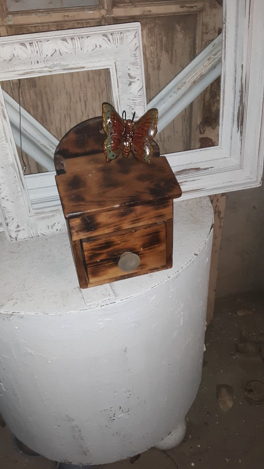 SMALL ANTIQUE HANGING HIDE AWAY WITH CERAMIC BUTTERFLY
