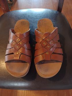 Interior Desiugner's  shoes: Leather sandals size(7) BARE TRAPS $10. More shoes. See description