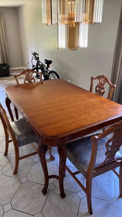 Large dining room table with 6 chairs