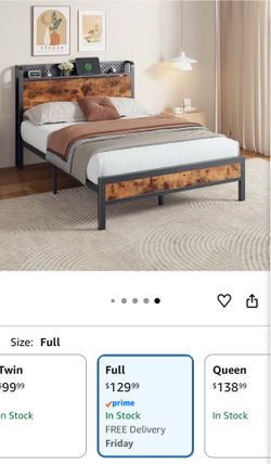 Full size bed frame.  Brand new in box. Never opened $100 OBO.