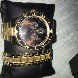 Gold And Black Watch And Gold Bracelet 