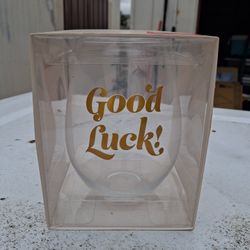 Creative Brands Slant Collections jumbo stemless wine glass with "Good Luck!" written in gold lettering. 