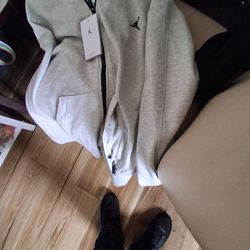 Brand new gray with black men's xl hoodie.