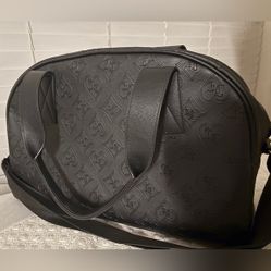 Juicy Couture Semi Charmed Dome Weekender bag in the color Liquorice