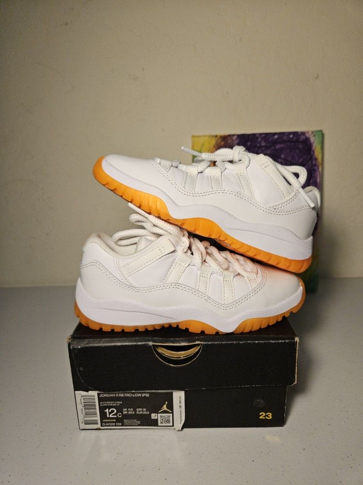 Size 12c - Citrus Jordan 11 Low's - $115