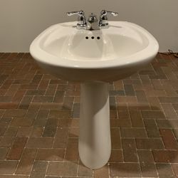 Sink including faucet.