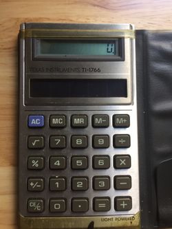 Vintage early 1980’s Texas Instruments pocket light solar powered calculator