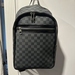 LOUIS VUITTON “MICHAEL” BACKPACK