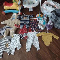 Clothing And Some Toys Baby..Size New Born To 2 Months Little Used All For $20 Dollar