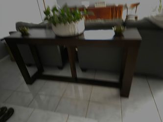 Grey couch and sofa table
