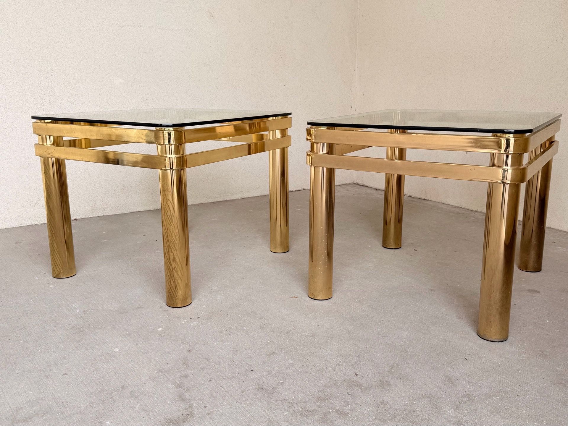 A Pair of Glass-top End Tables