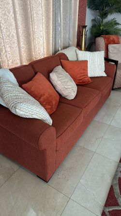 Sofa with pillows.