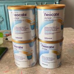 Neocate Jr Vanilla 4 Tins 14.1oz each. Exp 09/2026