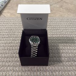 Citizen Automatic silver watch with green dial