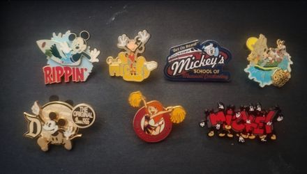 12 Vintage Walt Disney pins and Magnets