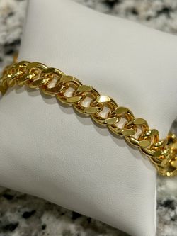 NEW 18ktgp chain link bracelet. 