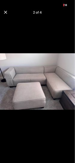 Tan sectional couch with ottoman