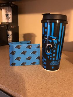 Carolina Panthers cup and Dooney and Bourke Trifold leather wallet