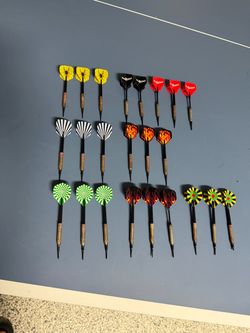 The MaxMau Soft Tip Darts are designed for electronic dartboard use, featuring plastic point darts with standard dart flights. These darts offer a sof