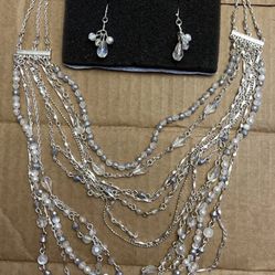  Silver Toned And Beaded Multistrand Necklace And Earring Set.