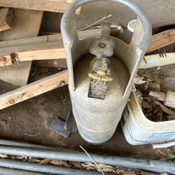 Propane Tank About 8 Inches Wide By 24 Inches