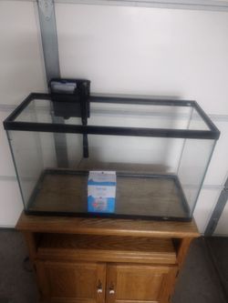 Glass aquarium with stand and filter