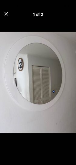 Round mirror ! Dorado Furniture