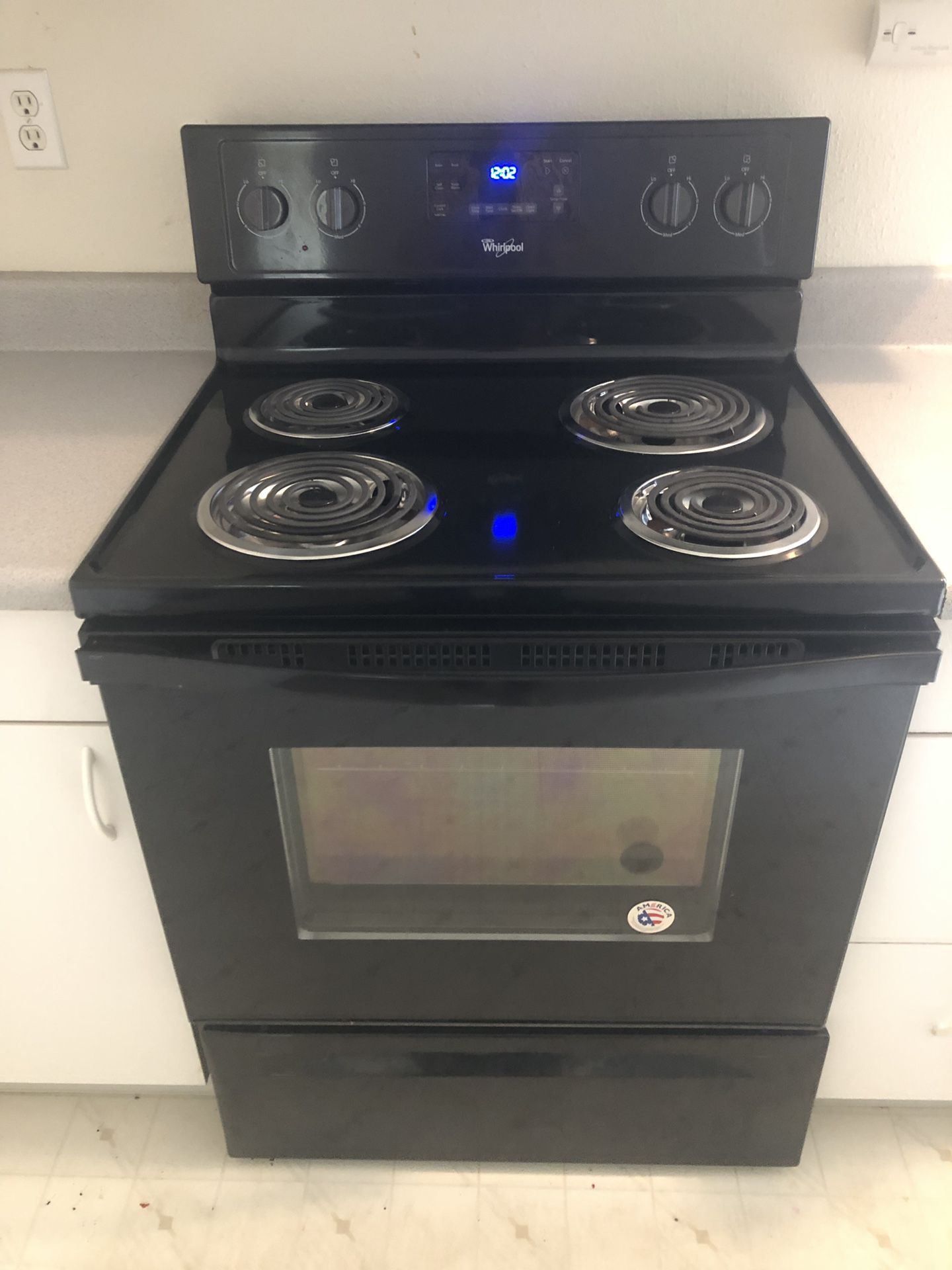 Whirlpool electric range . 8 months old . Excellent condition.self cleaning