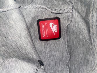 Grey Nike tech sweats