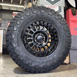 KMC IMS All Black 18x9 +0 6x5.5 W/ 37” Toyo Rt Trail