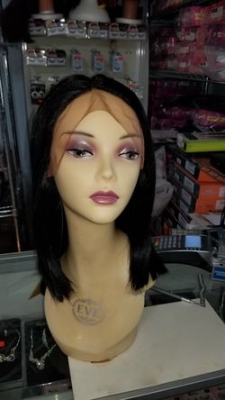 Synthetic Lace Front & Heat Safe Wig.