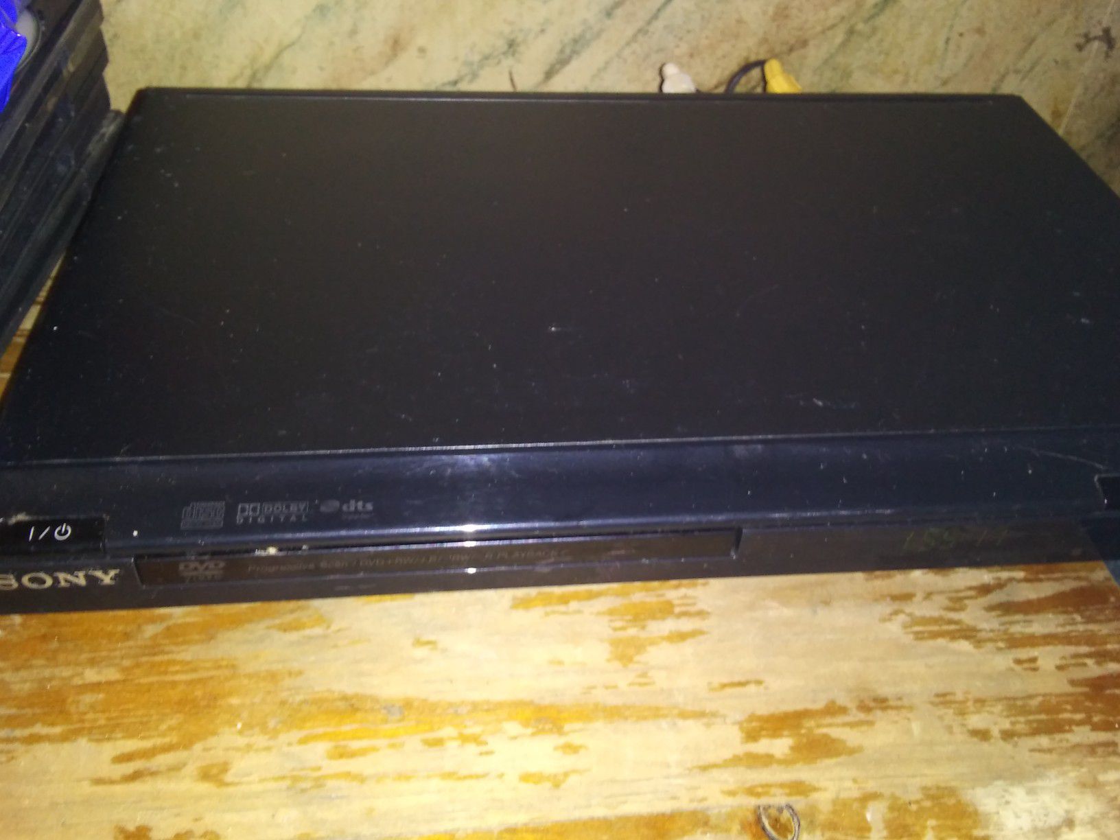 Sony dvd player with 50 DVDs with racks lot