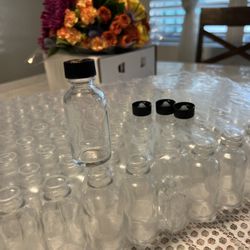 1 OZ 30 ML CLEAR GLASS BOTTLES WITH POLY CONE LINED BLACK CAPS
