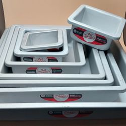 8 Fat Daddio's 2-inch deep square cake pans in various sizes