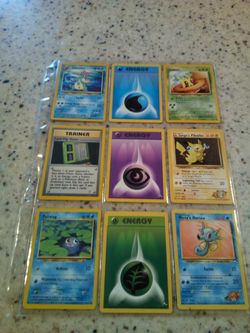 Vintage 1990's Pokemon/9 cards/3- energy/ croconaw/ sunkern/ trainer/ lt. Surge's Pikachu/ Poliwag/ Misty's horsea