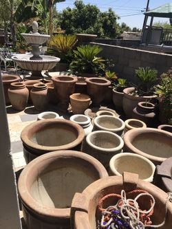 Many pots and fountains