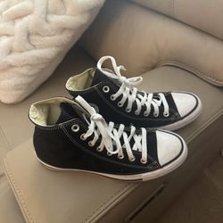 New High top Converse  Size M7 W9. $35