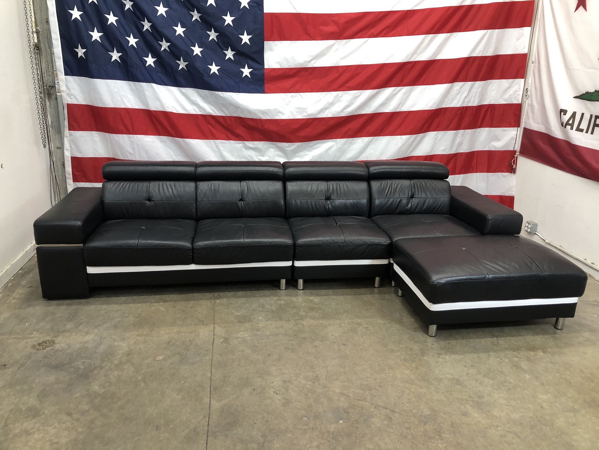 Free Delivery - Black Leather Sectional & Ottoman