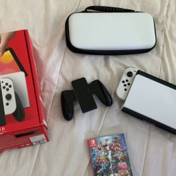 Nintendo Switch OLED W/ Super Smash Bros, Screen Protector, & Carrying Case 