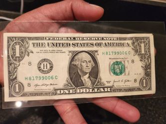 Rear dollar bill- misaligned serial number