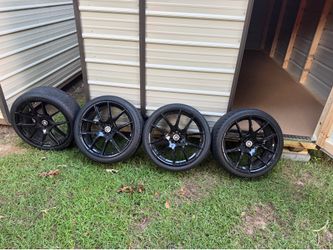 Like new mint condition Spec-1 SP-71 Gloss Black racing rims & tires