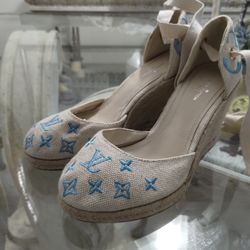 Louis Vuitton (7.5)