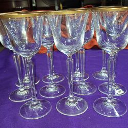 Vintage Set of 11 Mikasa Lead Crystal Wheaton Goblet Wine Glass 8 inch Tall  featuring a clear hexagonal stem and a delicate gold band around the rim.
